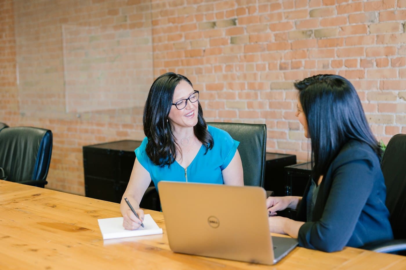 A Reddington recruiter interviewing a candidate across a desk